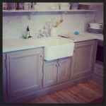 Custom marble shelving and integrated undermount fridges.